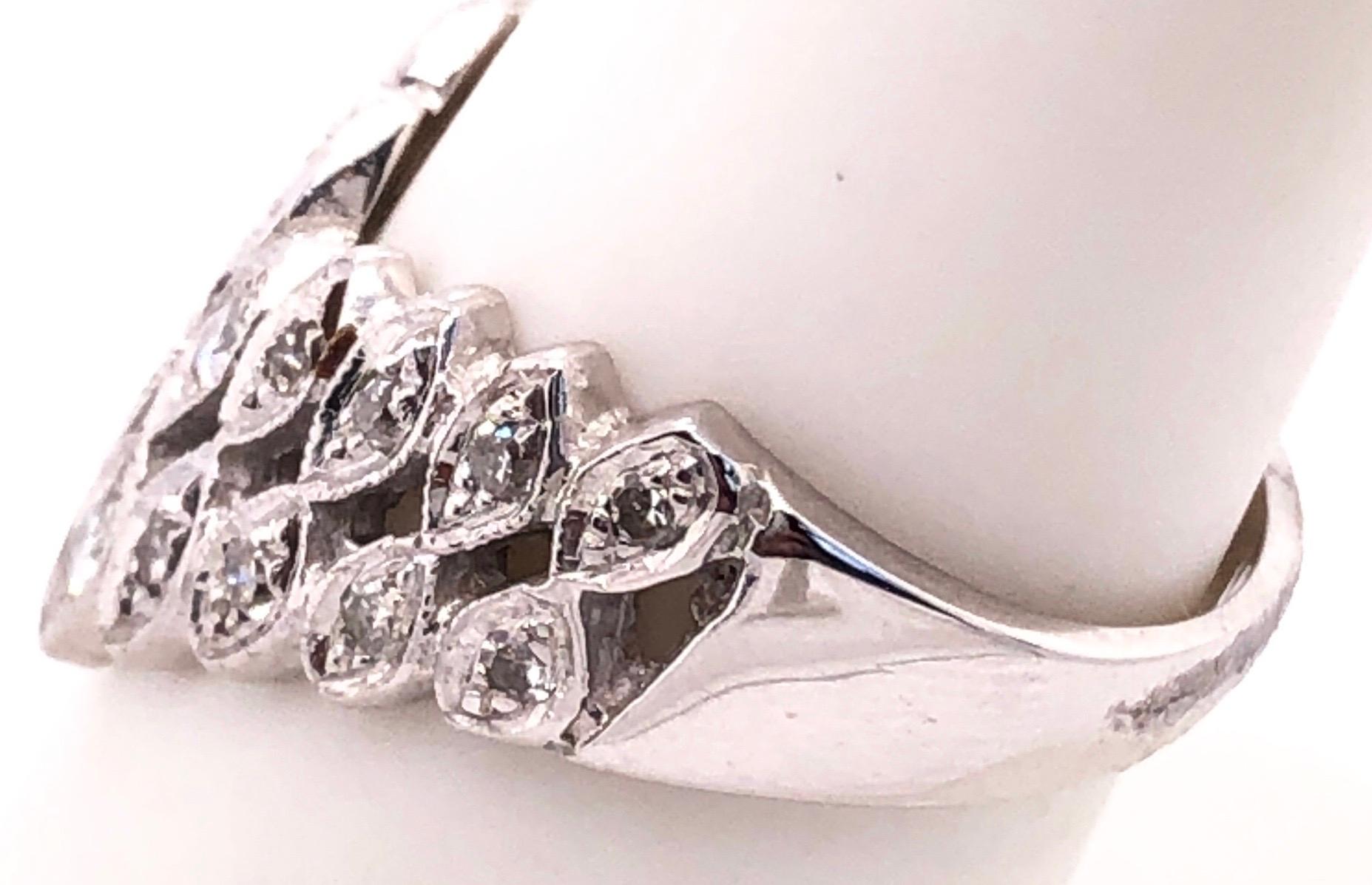 14 Karat White Gold And Diamond Band Wedding / Bridal Ring
0.75 total diamond weight.
Size 6
5 grams total weight.