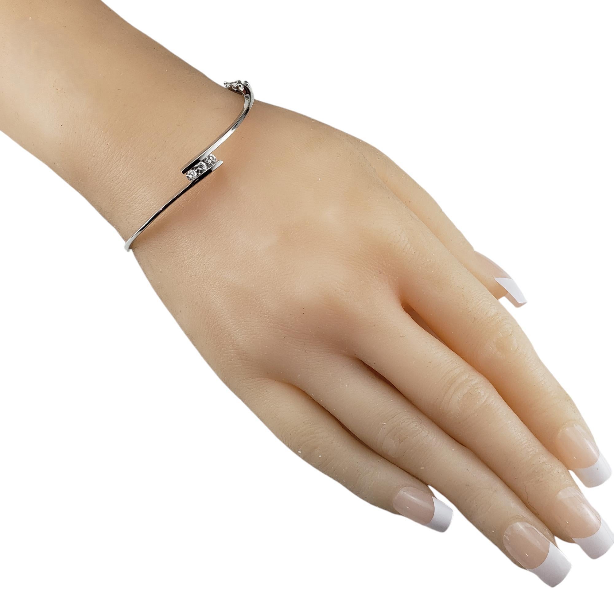 Bracelet jonc en or blanc 14 carats et diamants n° 18738 1