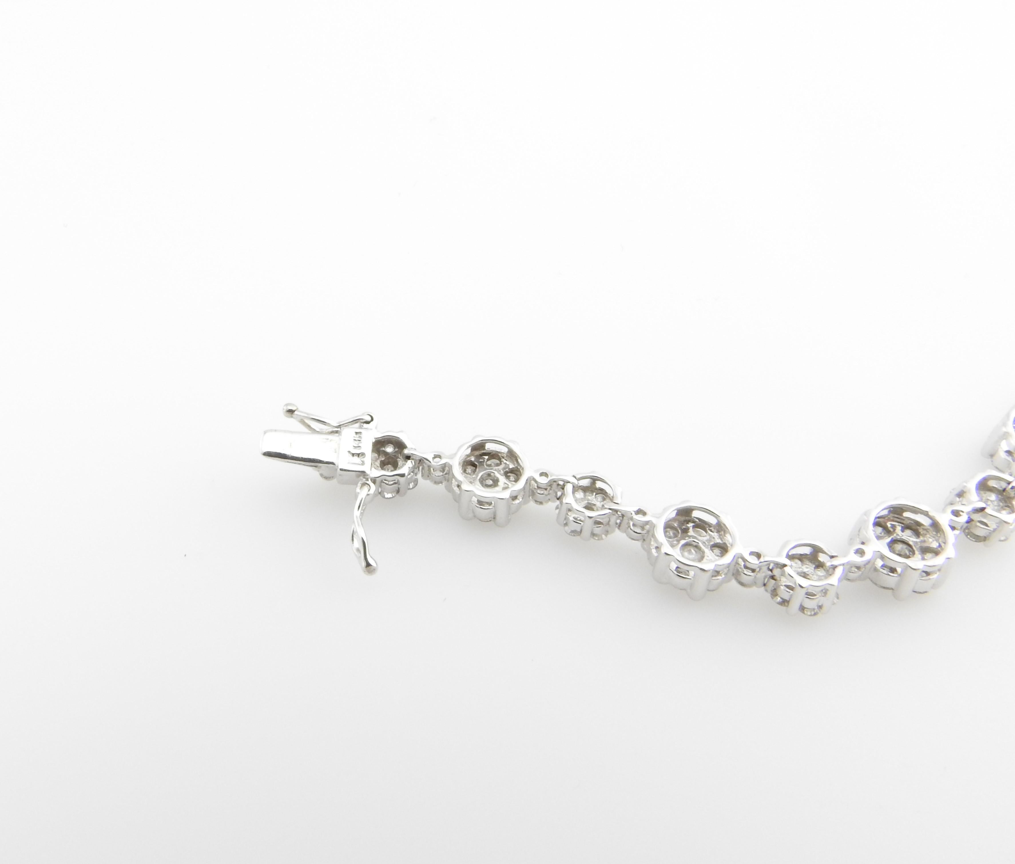 14 Karat White Gold and Diamond Floral Tennis Bracelet 2