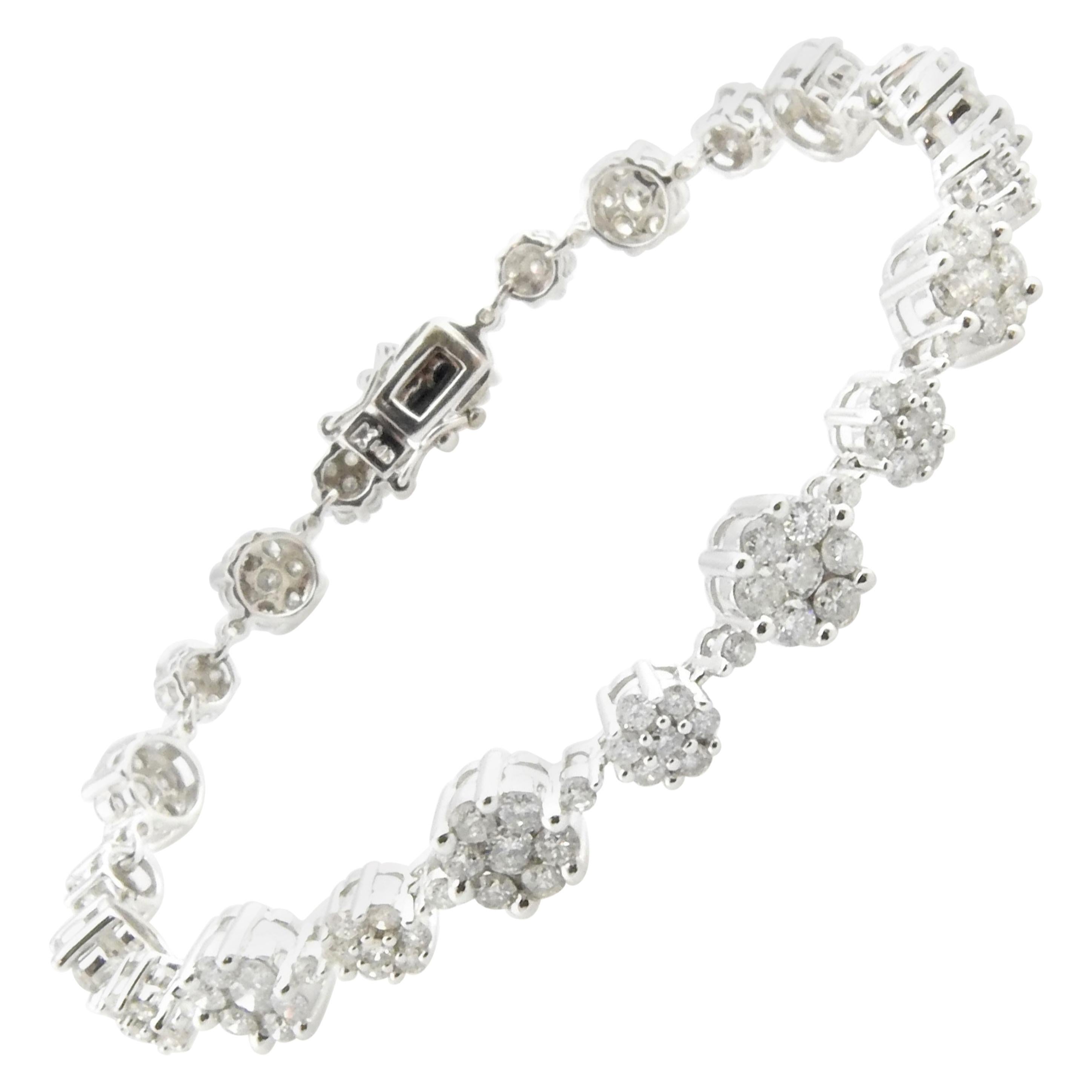 14 Karat White Gold and Diamond Floral Tennis Bracelet