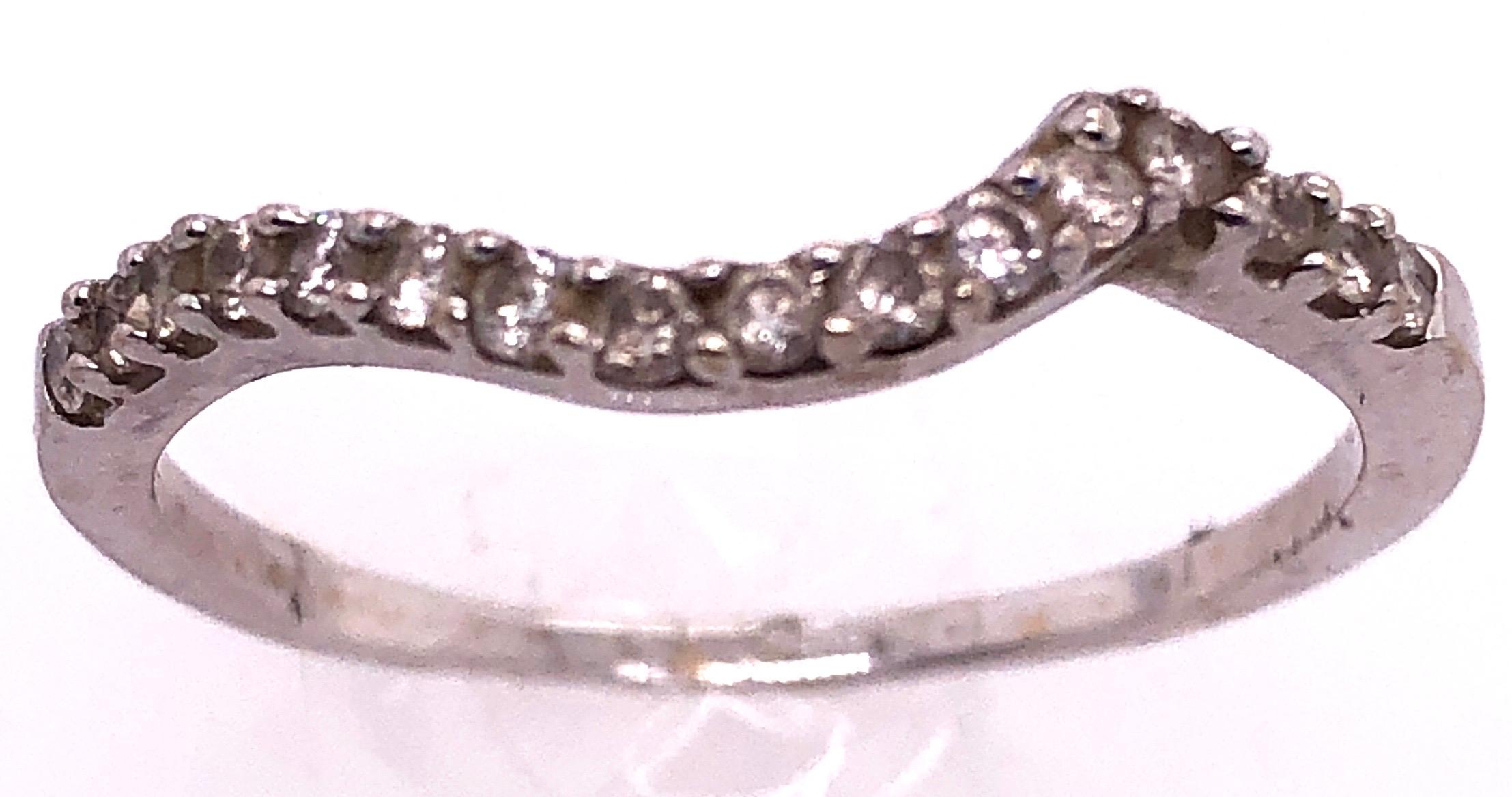 14 Karat White Gold And Diamond Free Form Ring
Size 8
2 grams total weight.
.25 tdw
