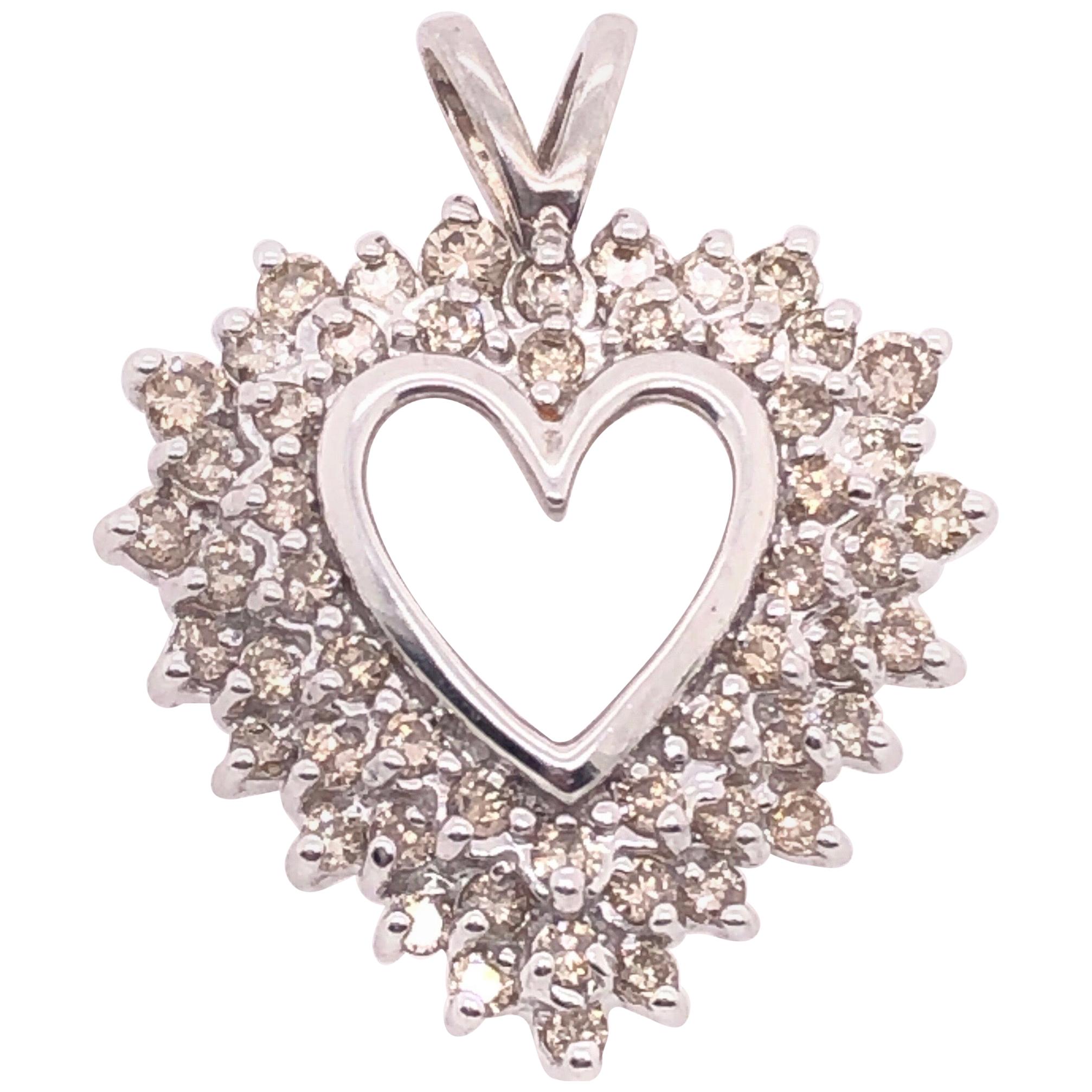 14 Karat White Gold and Diamond Heart Pendant