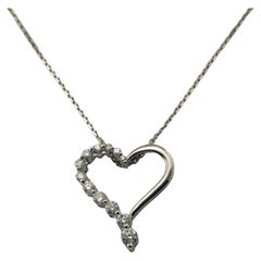 14 Karat White Gold and Diamond Heart Pendant Necklace