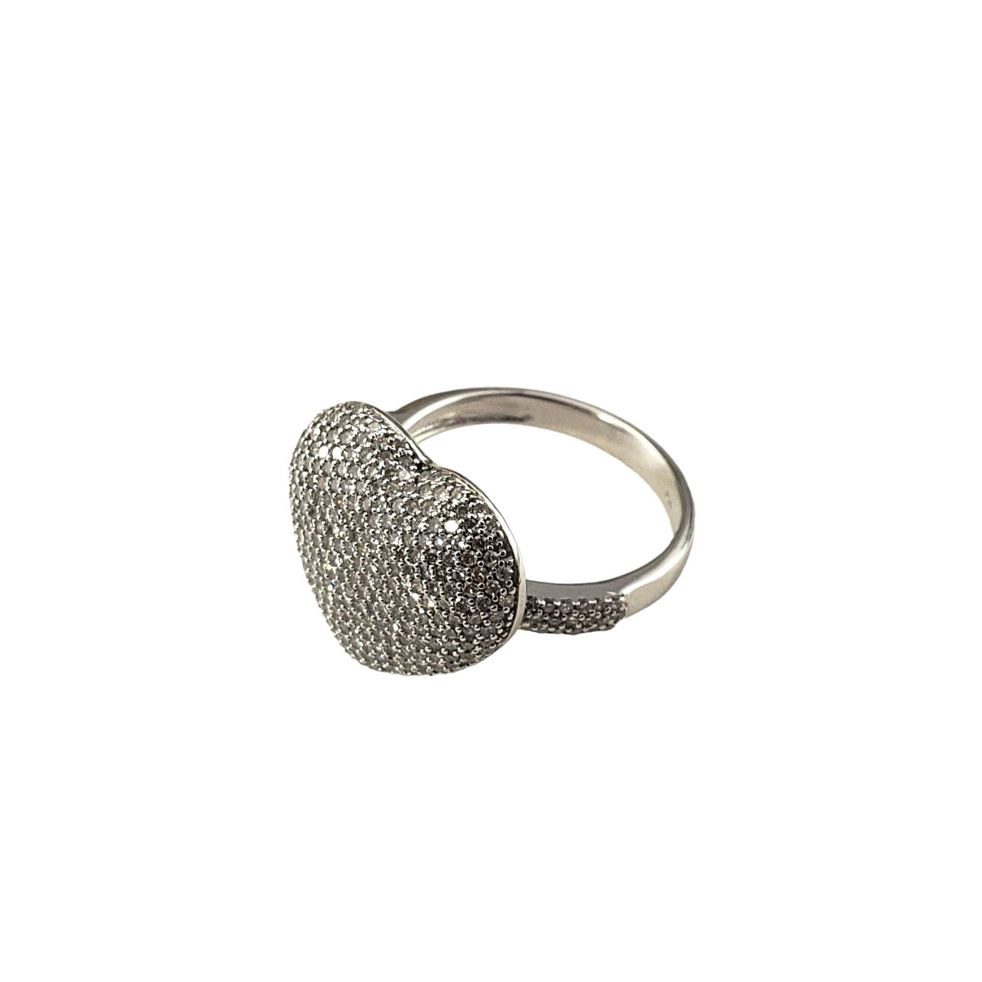 14 Karat White Gold and Diamond Heart Ring Size 7-

This sparkling heart ring features 282 round single cut diamonds set in beautifully detailed 14K white gold. Width: 15 mm. Shank: 2.7 mm.

Approximate total diamond weight: 1.25 ct.

Diamond