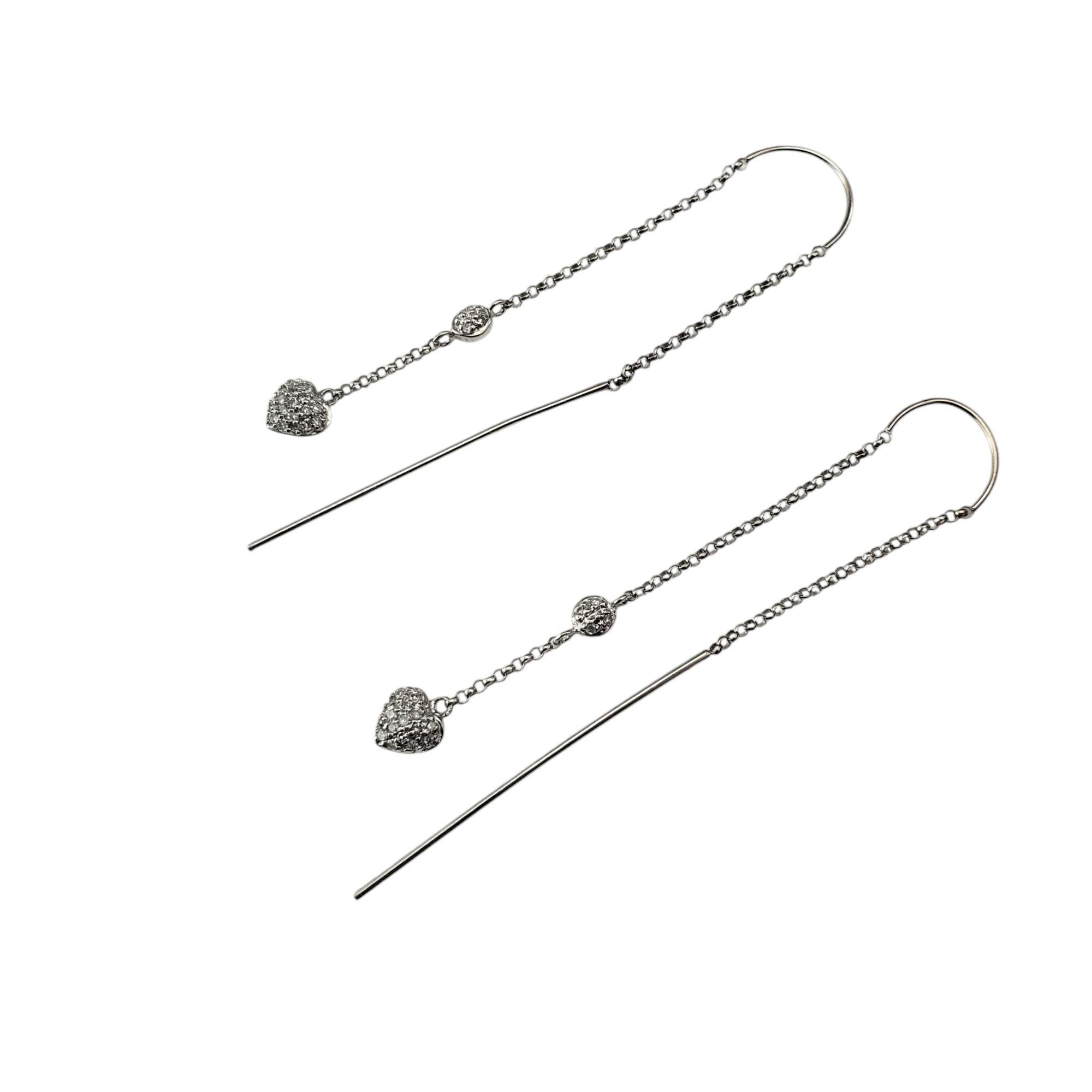 14 Karat White Gold and Diamond Heart Threader Earrings

These elegant 14K white gold earrings feature delicate diamond accented charms, adding a touch of luxury. The threader design allows for comfortable wear and a chic, modern look.

Approximate