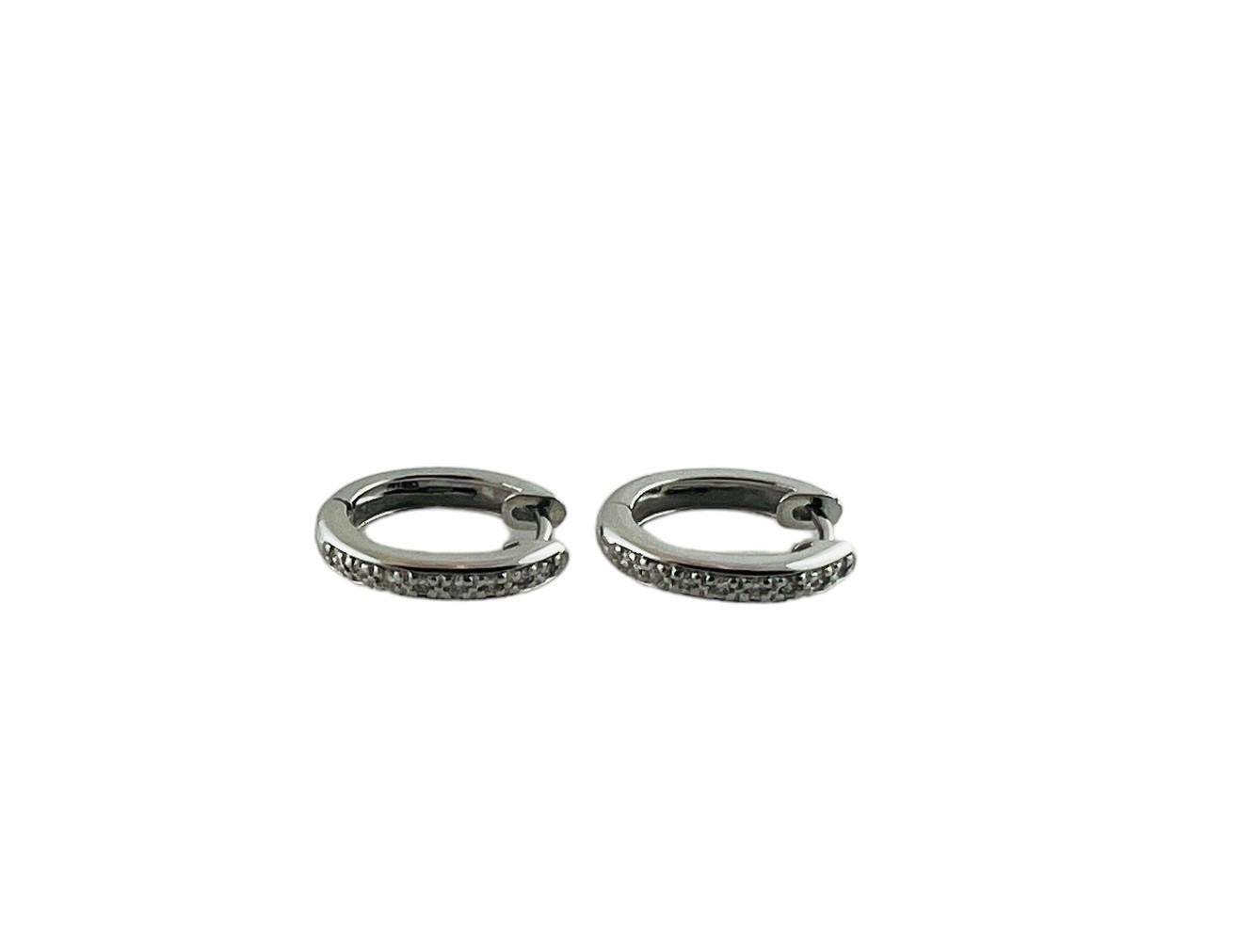 14 Karat White Gold and Diamond Oval Huggie Earrings #20991 In Good Condition For Sale In Washington Depot, CT