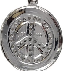 14 Karat White Gold and Diamond Peace Pendant