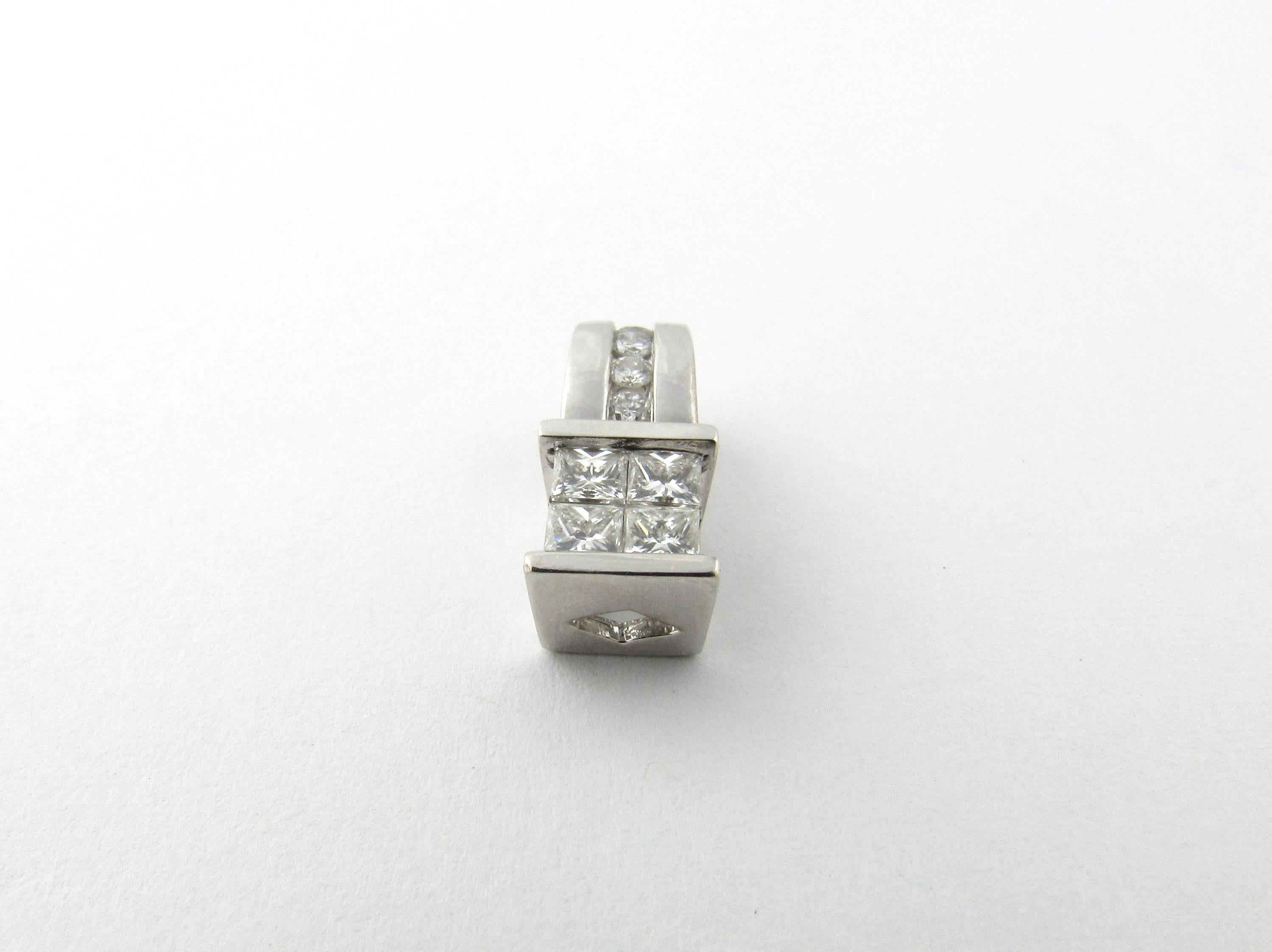 Vintage 14 Karat White Gold and Diamond Pendant- 
This sparkling pendant features four princess cut diamonds and four round brilliant cut diamonds set in meticulously detailed white gold.
 Approximate total diamond weight: .37 ct. Diamond clarity: