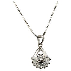 Collier pendentif en or blanc 14 carats et diamants