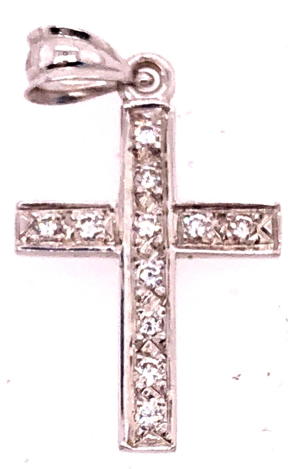 14 Karat White Gold Religious / Crucifix Pendant with Eleven Round Diamonds.
0.25 Total diamond weight
5.1 grams total weight.
28.99 mm height.