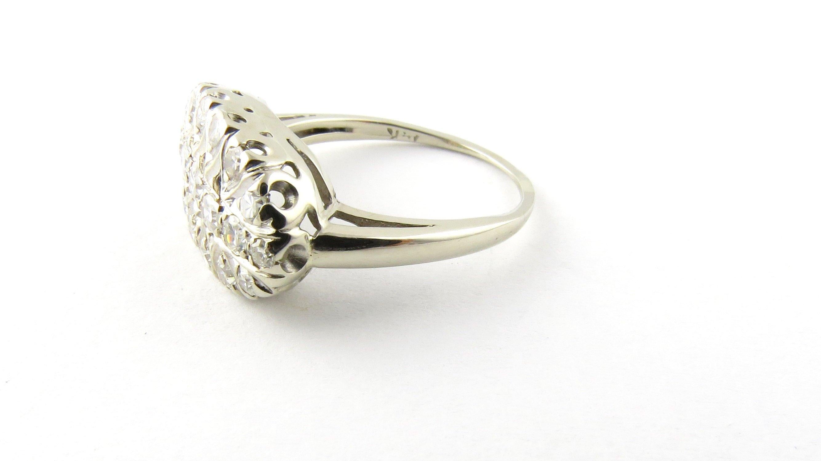 Round Cut 14 Karat White Gold and Diamond Ring