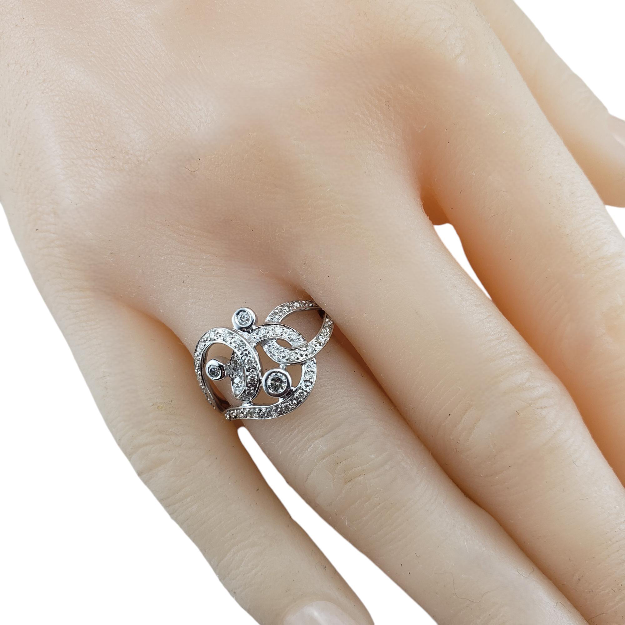 14 Karat White Gold and Diamond Scrolling Ring Size 7.25 #18736 For Sale 1