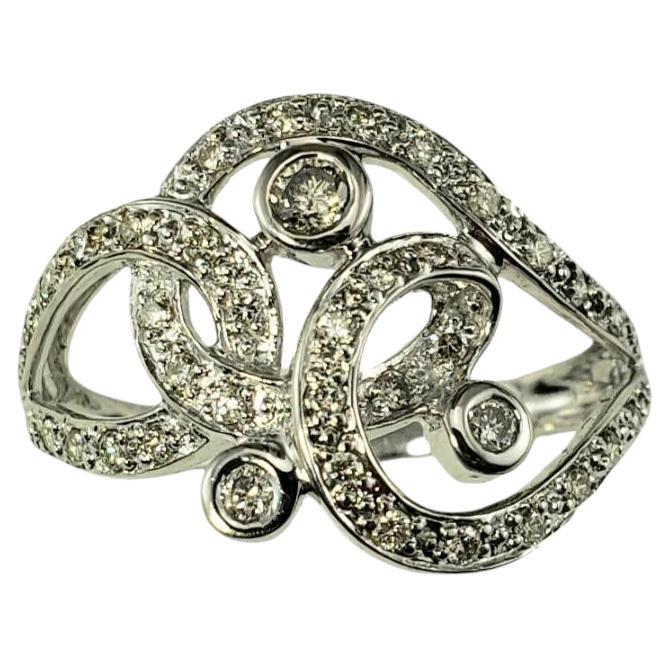 14 Karat White Gold and Diamond Scrolling Ring Size 7.25 #18736 For Sale