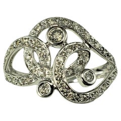 14 Karat White Gold and Diamond Scrolling Ring Size 7.25 #18736