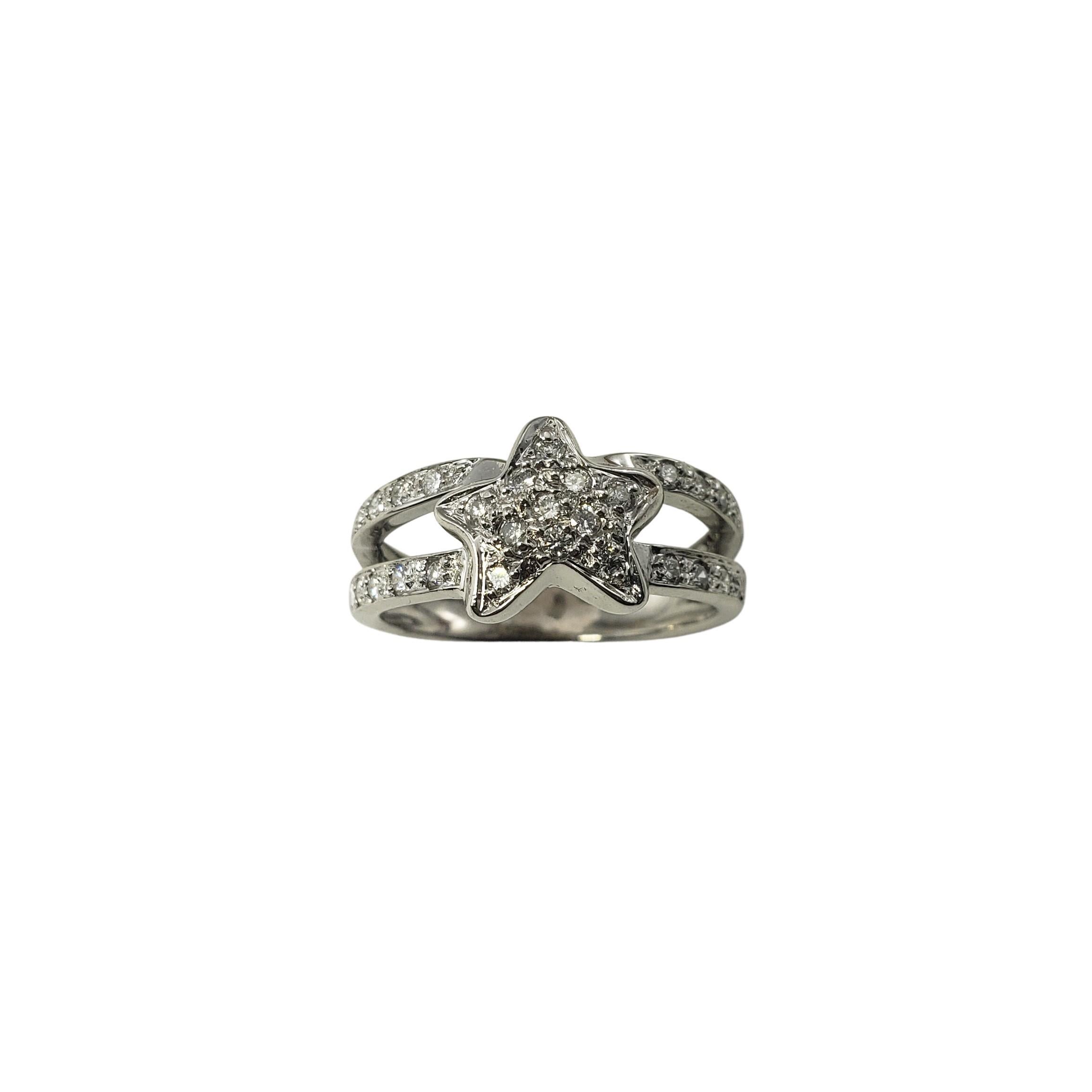 14 Karat White Gold and Diamond Star Ring Size 7.5-

This sparkling 14K white gold ring features 27 round brilliant cut diamonds set in a beautifully detailed star design.    Width:  9 mm.
Shank:  4 mm.

Approximate total diamond weight:  .30