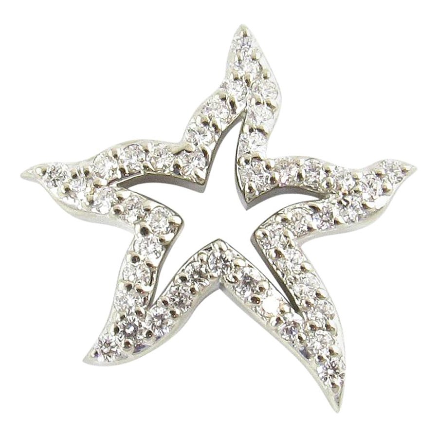 Pendentif étoile de mer en or blanc 14 carats et diamant