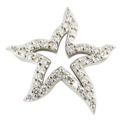Pendentif étoile de mer en or blanc 14 carats et diamant