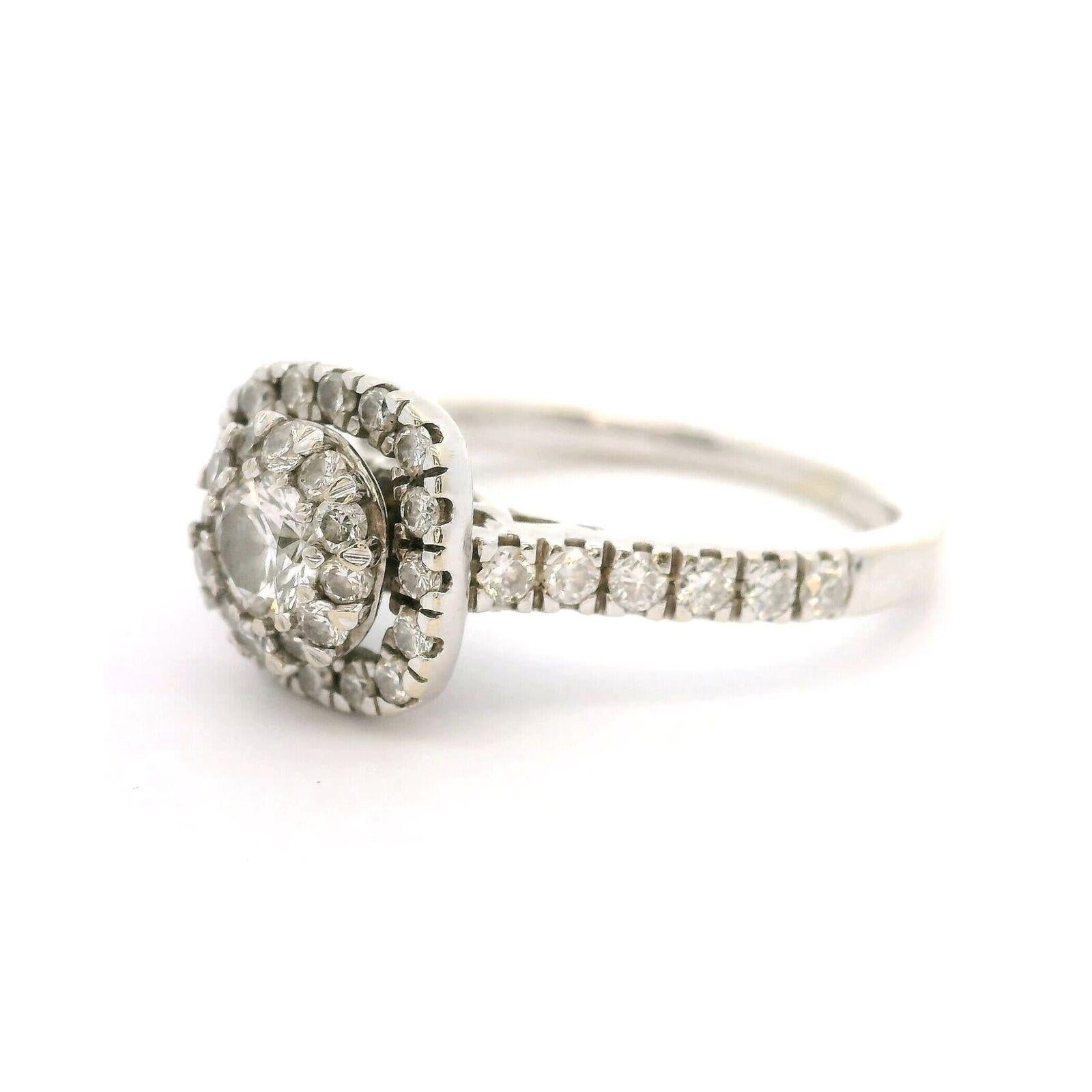 14k White Gold and Diamond Vintage Cluster Halo Ring Size 5.25

Condition:  Excellent Condition, Professionally Cleaned and Polished
Metal:  14k Gold (Marked, and Professionally Tested)
Weight:  3.2g
Diamonds:  Round Cut Diamonds 0.50cttw
Face