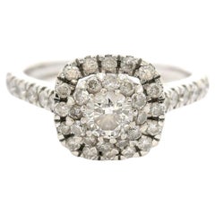 Bague halo vintage en or blanc 14 carats et diamants