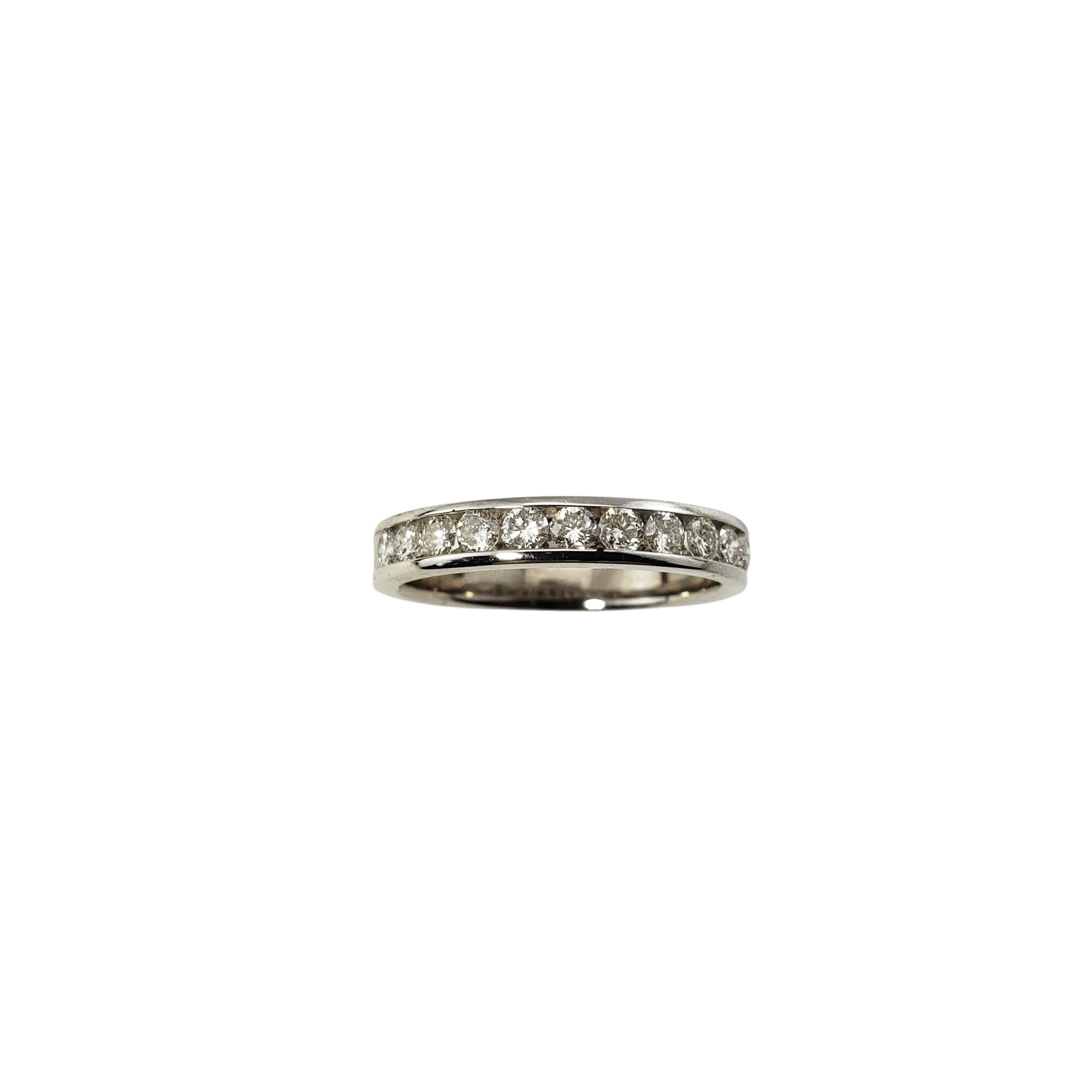 14 Karat White Gold and Diamond Wedding Band Ring Size 5.5-

This sparkling wedding band features 11 round brilliant cut diamonds set in classic 14K white gold.  Width:  3 mm.  Shank:  3 mm.

Approximate total diamond weight:  .44 ct.

Diamond
