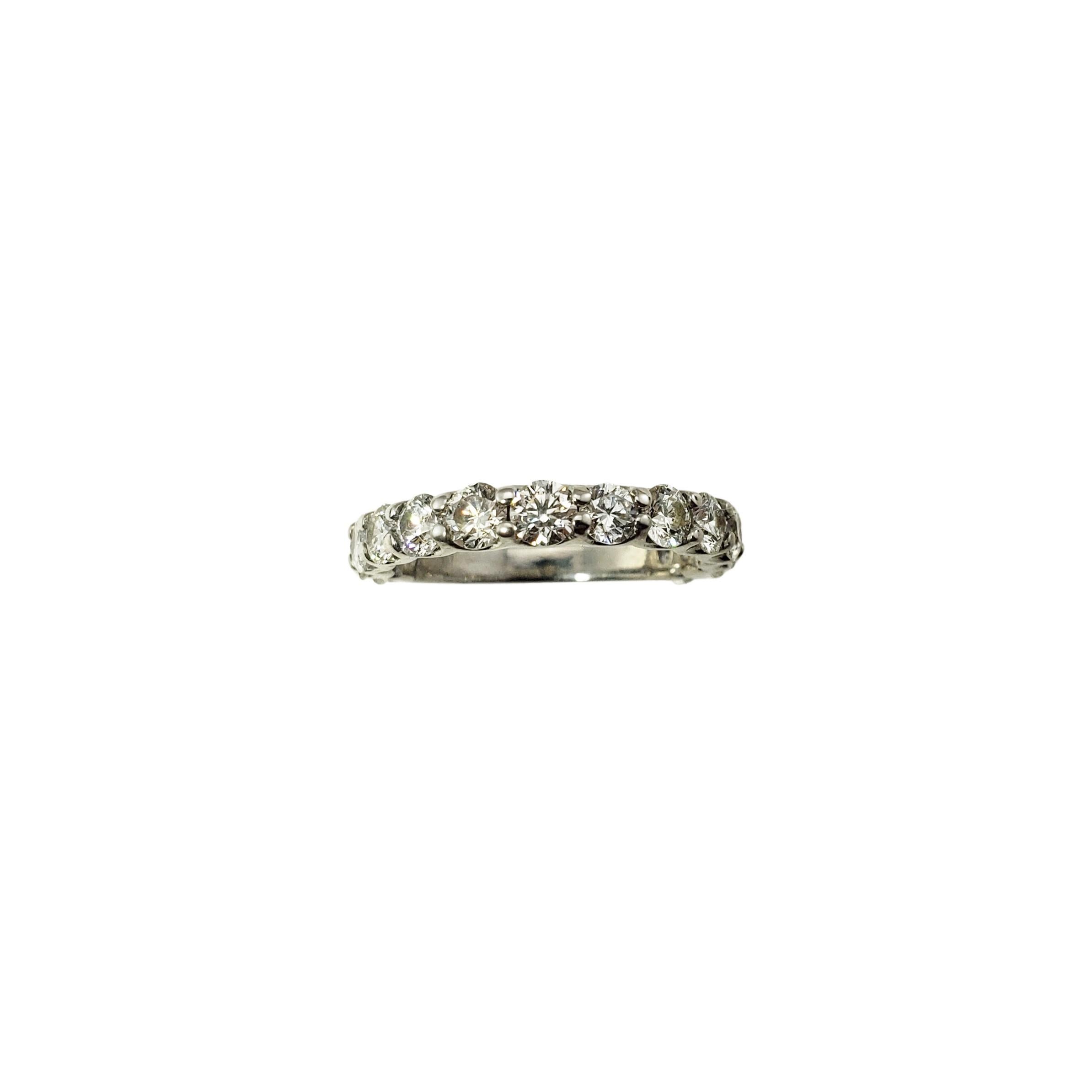 14 Karat White Gold Diamond Wedding Band Ring Size 6.5-

This sparkling band features 14 round brilliant cut diamonds set in classic 14K white gold.  Width:  3.5 mm.  Shank:  2 mm.

Approximate total diamond weight:  1.64 ct.

Diamond color: