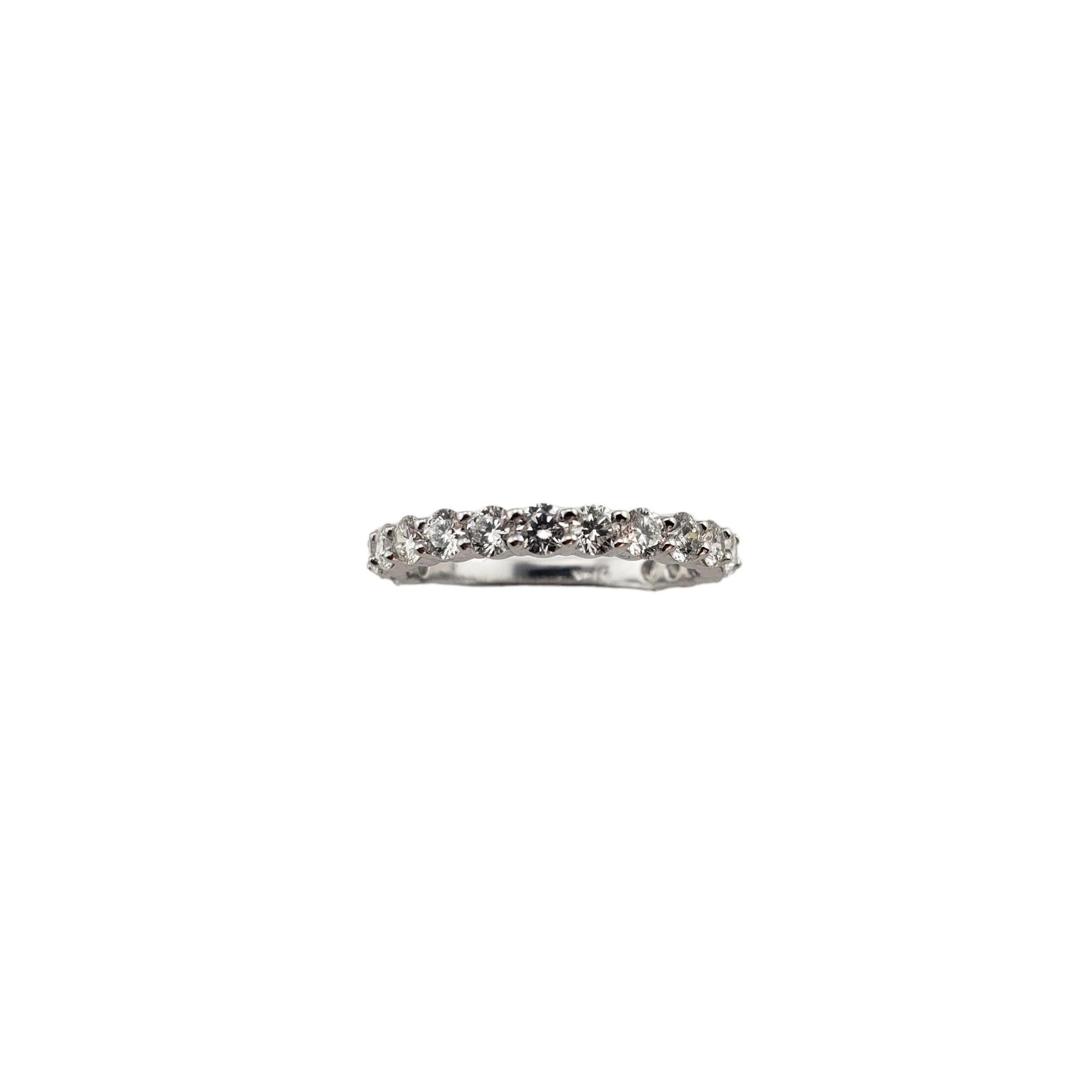 Vintage 14 Karat White Gold and Diamond Band Ring Size 5.75-

This sparkling band features 17 round brilliant cut diamonds* set in classic 14K white gold. Width: 2 mm.

* Chip noted to one diamond not visible to naked eye.

Approximate total diamond