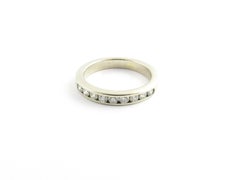 Alliance en or blanc 14 carats et diamants
