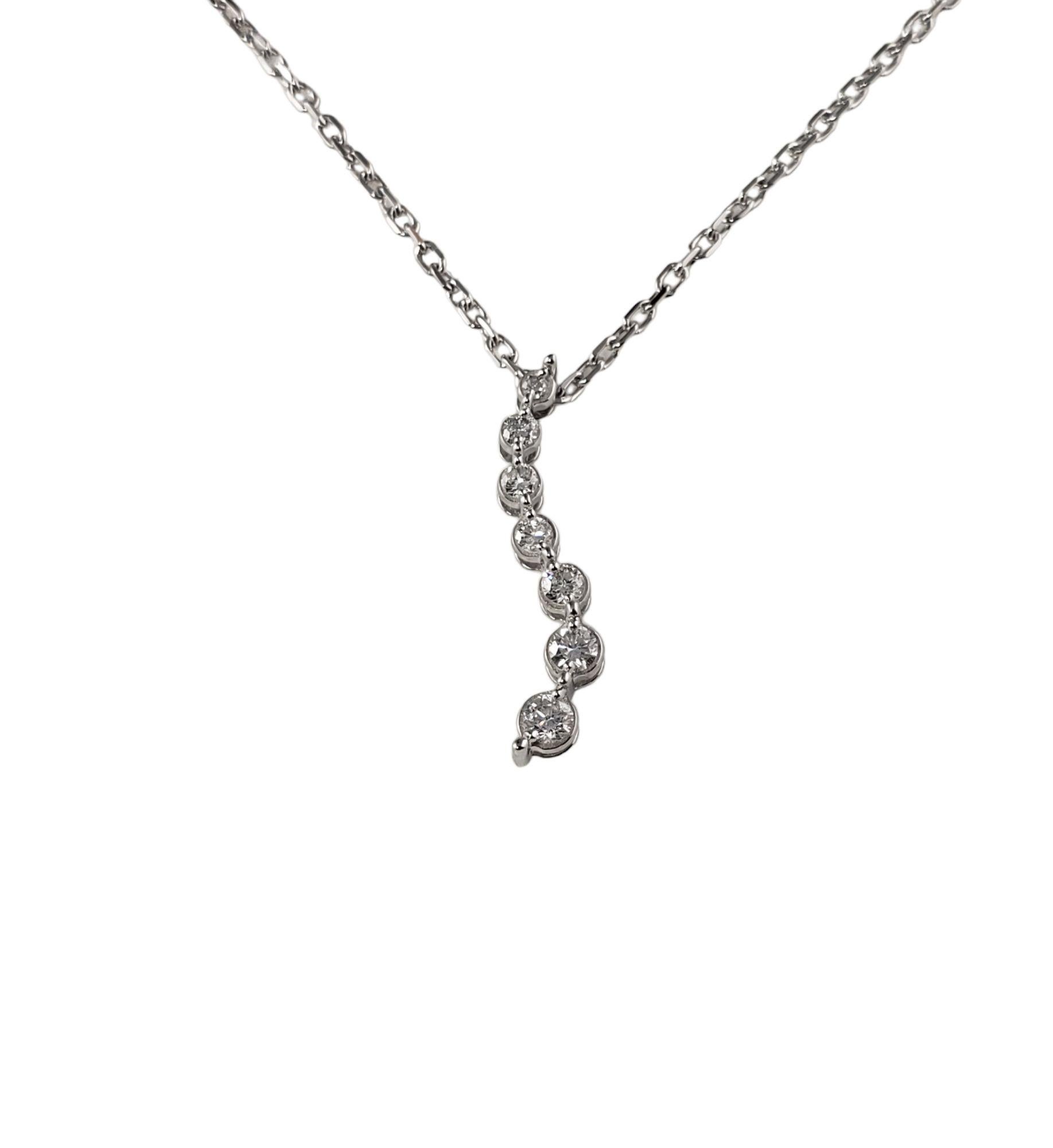 Women's 14 Karat White Gold and Graduated Diamond Pendant Necklace For Sale