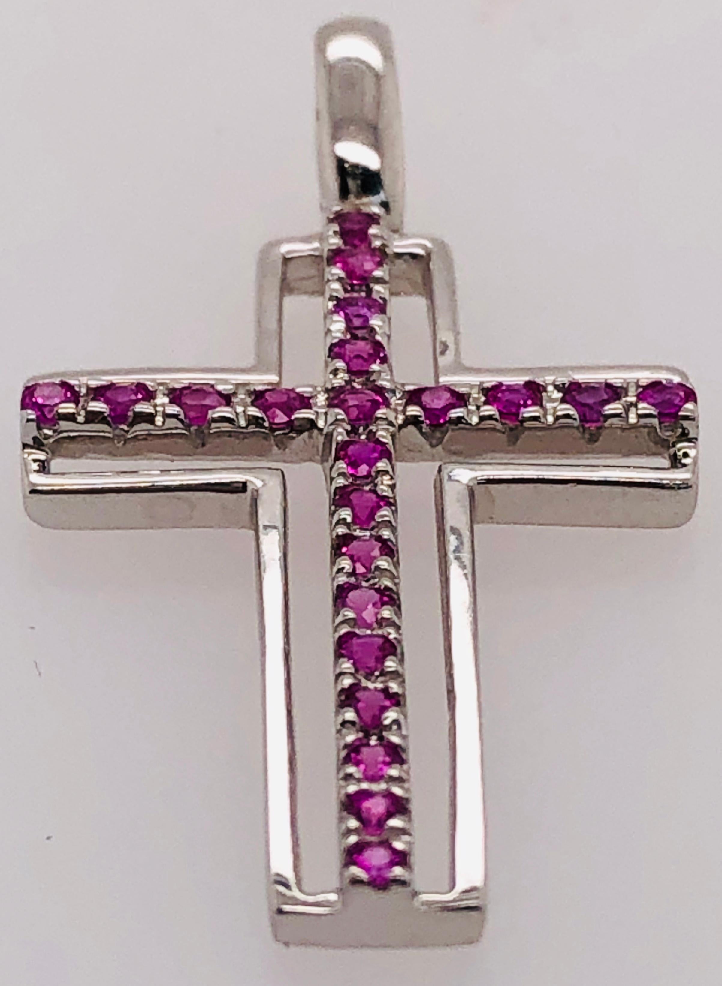 14 Karat White Gold and Pink Topaz Cross Pendant 
0.38 Total Weight of Stones
1.96 grams total weight.