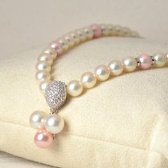 14 Karat White Gold and Platinum Pink Coral Core Pearl and Akoya Pearl Necklace