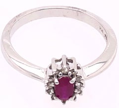 14 Karat White Gold and Ruby Ring Surrounded by Diamonds