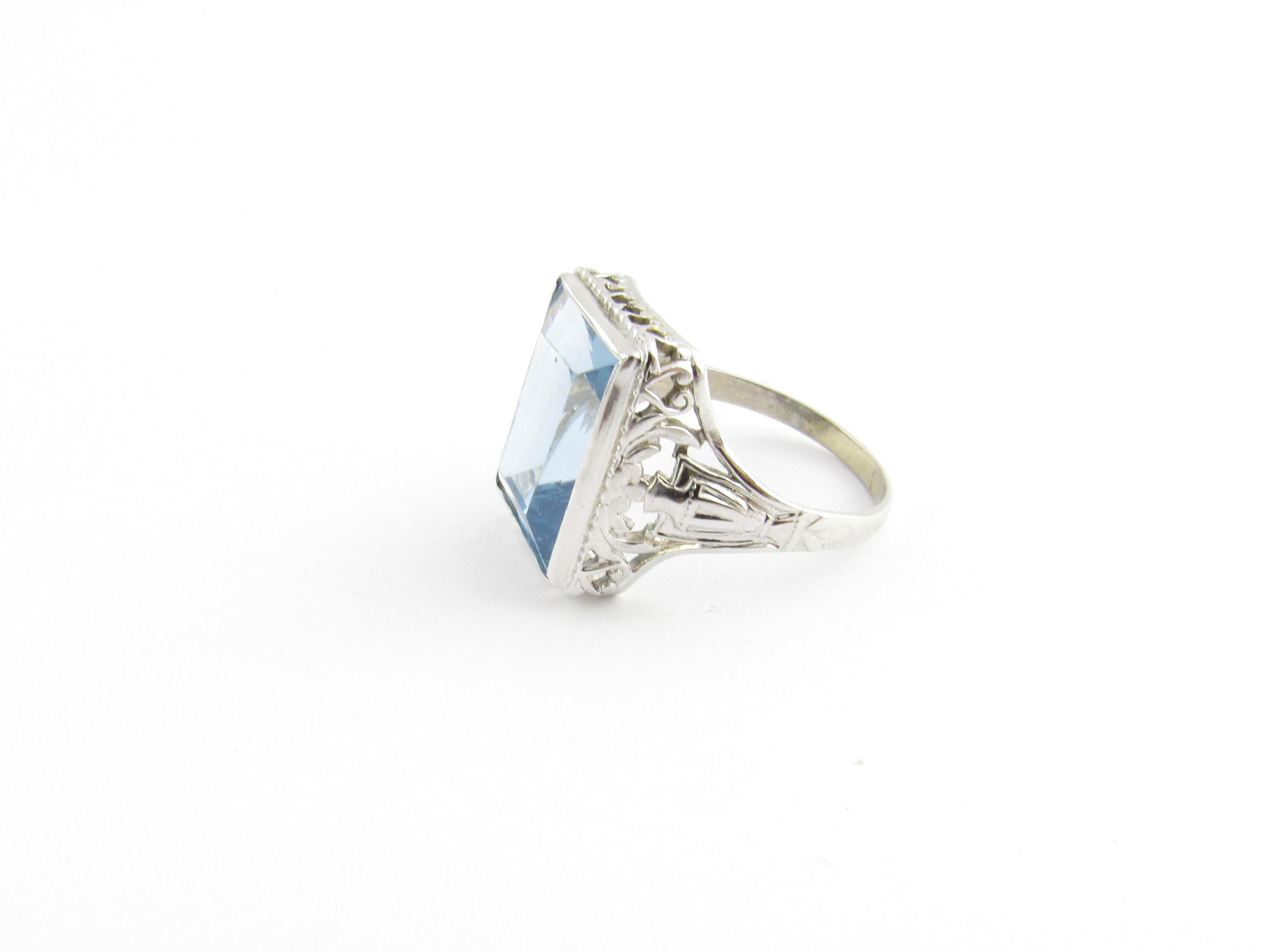14 Karat White Gold Simulated Blue Topaz Ring Size 7-

This lovely ring features one rectangular simulated blue topaz (15 mm x 13 mm) set in beautifully detailed 14K white gold.  Shank measures 2 mm.

Ring Size:  7

Weight:  2.7 dwt. /  4.2 gr.