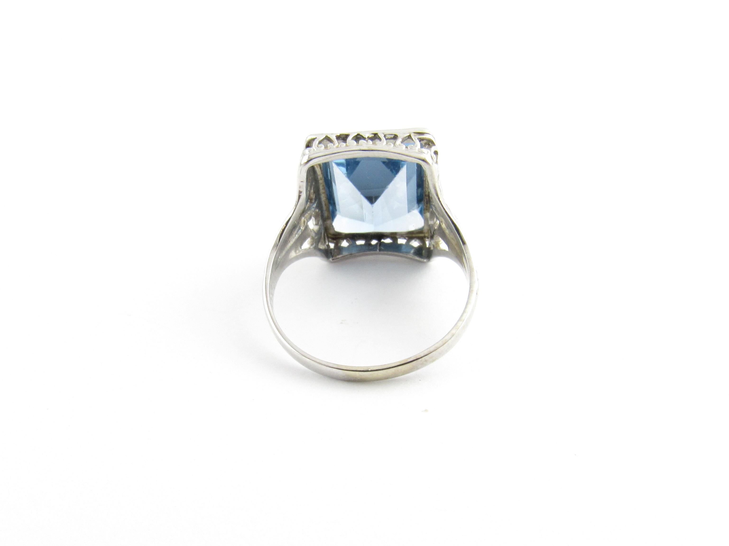 Emerald Cut 14 Karat White Gold and Simulated Blue Topaz Ring