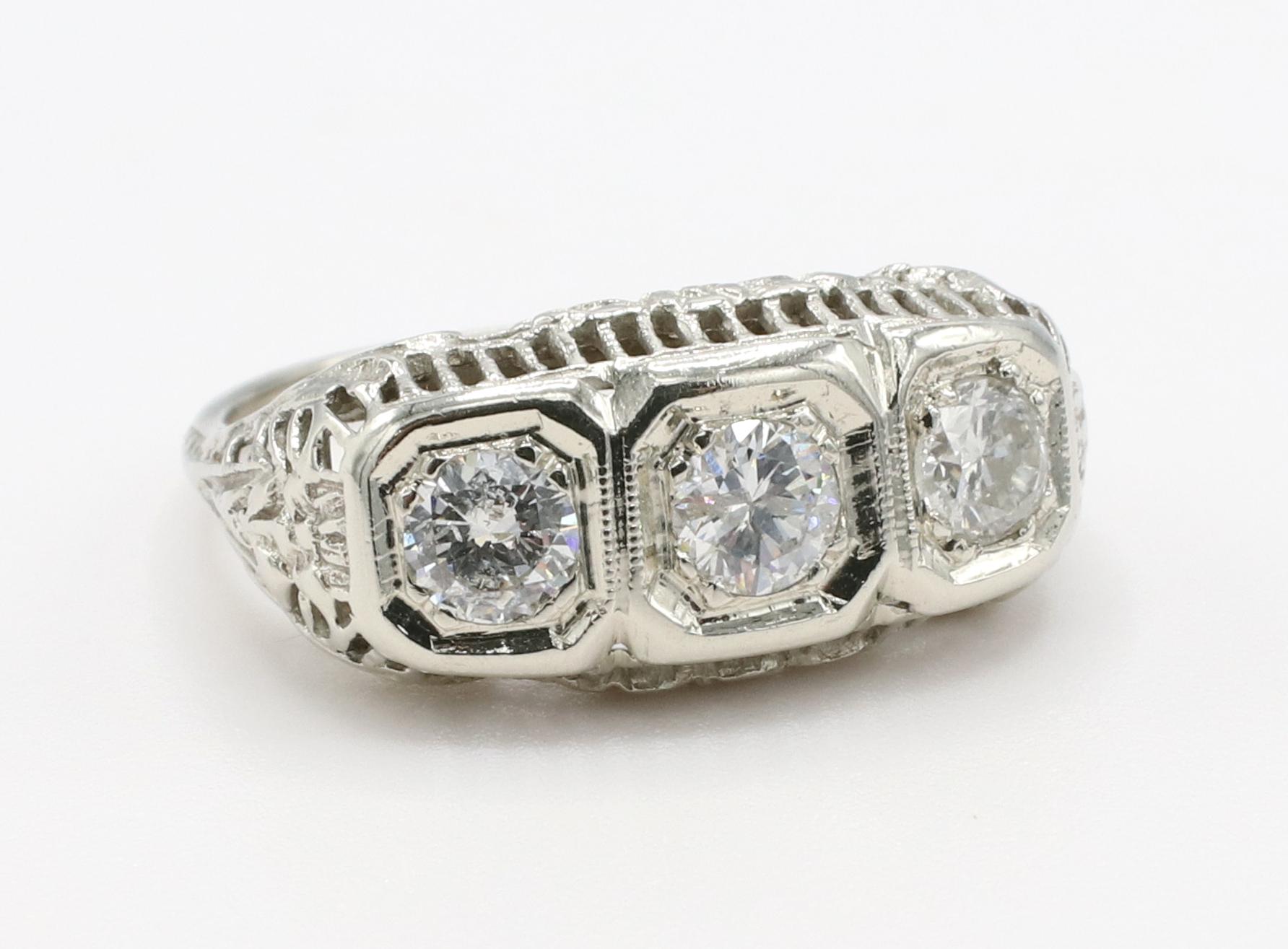 Art Deco 14 Karat White Gold Antique Natural Diamond Three-Stone Filigree Band Ring For Sale