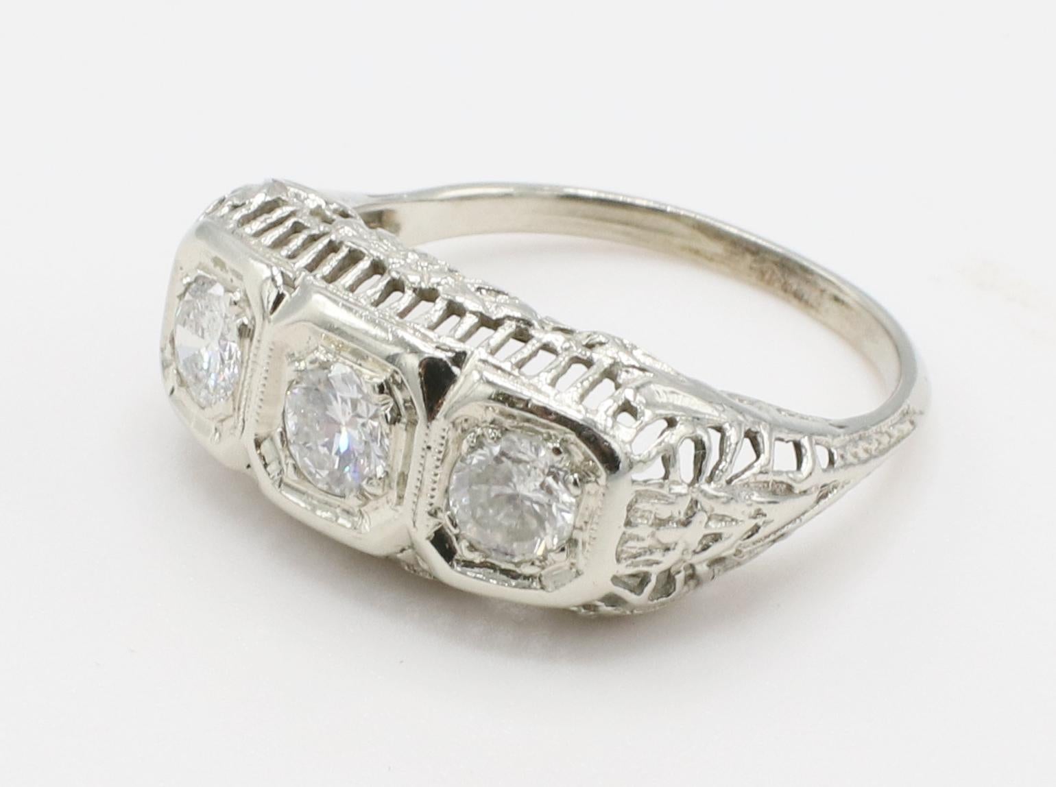 Women's 14 Karat White Gold Antique Natural Diamond Three-Stone Filigree Band Ring For Sale
