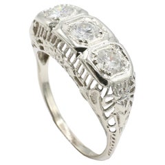 14 Karat White Gold Antique Natural Diamond Three-Stone Filigree Band Ring