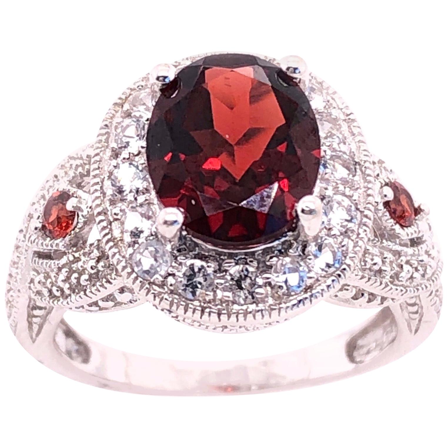 14 Karat White Gold Antique Ring Oval Garnet Center with Accents For Sale