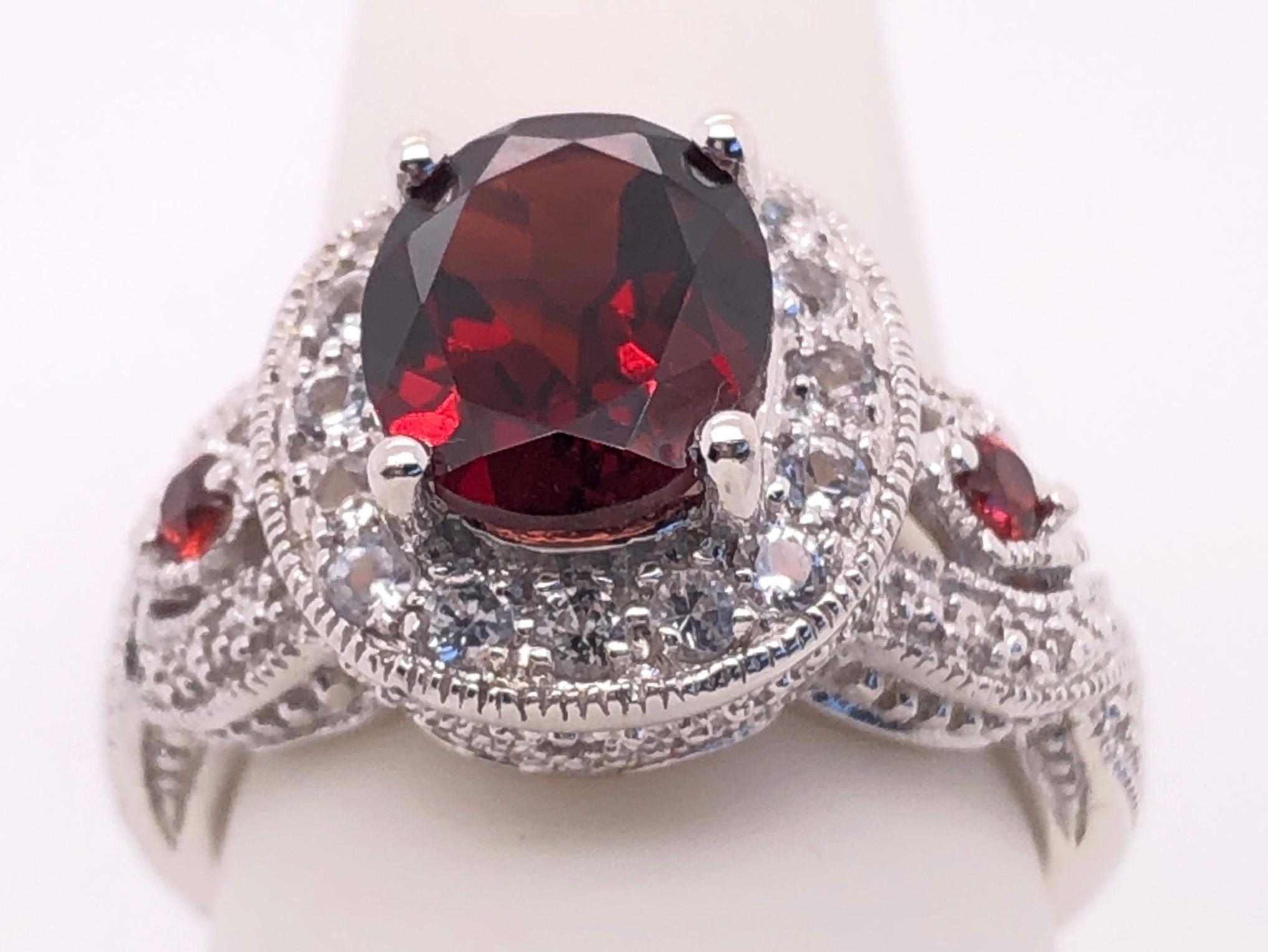 14 Karat White Gold Antique Ring Oval Garnet Center with Accents In Good Condition For Sale In Stamford, CT