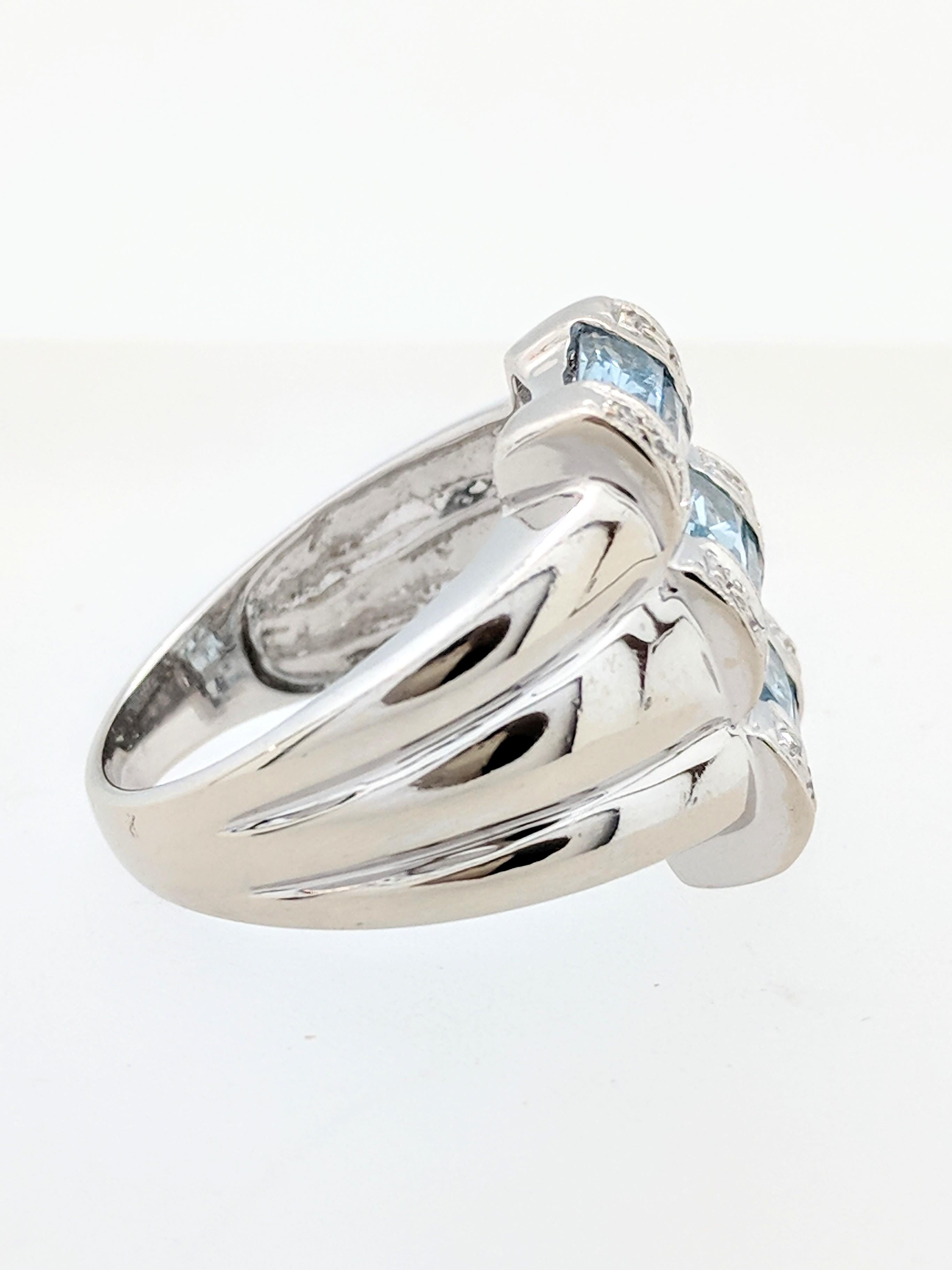 Modern 14 Karat White Gold Aquamarine and Diamond Ring