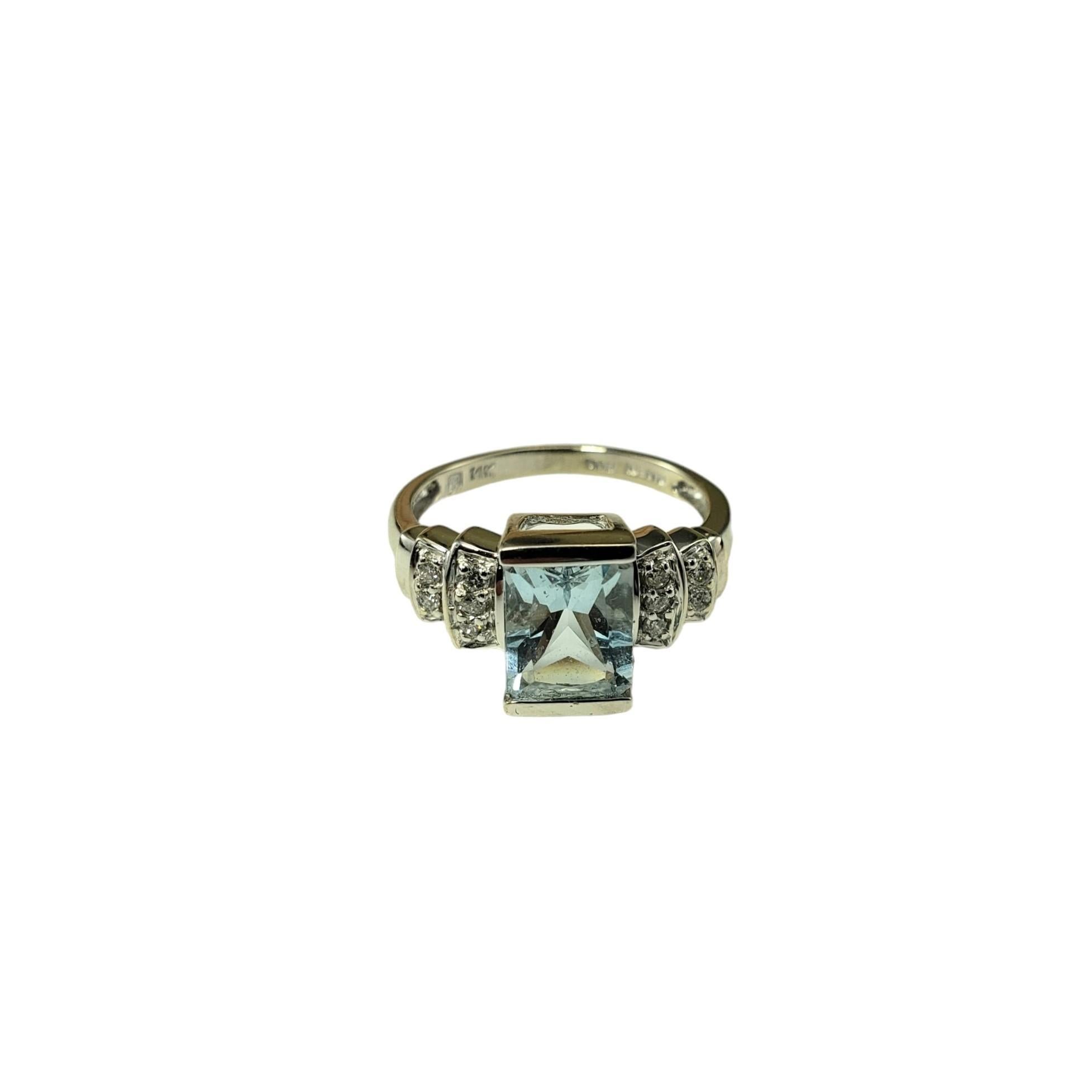 14 Karat White Gold Aquamarine and Diamond Ring Size 5.25

This stunning ring features one emerald cut aquamarine stone (8 mm x 6 mm) and ten round brilliant cut diamonds set in classic 14K white gold.  

Shank: 2 mm.

Approximate total diamond