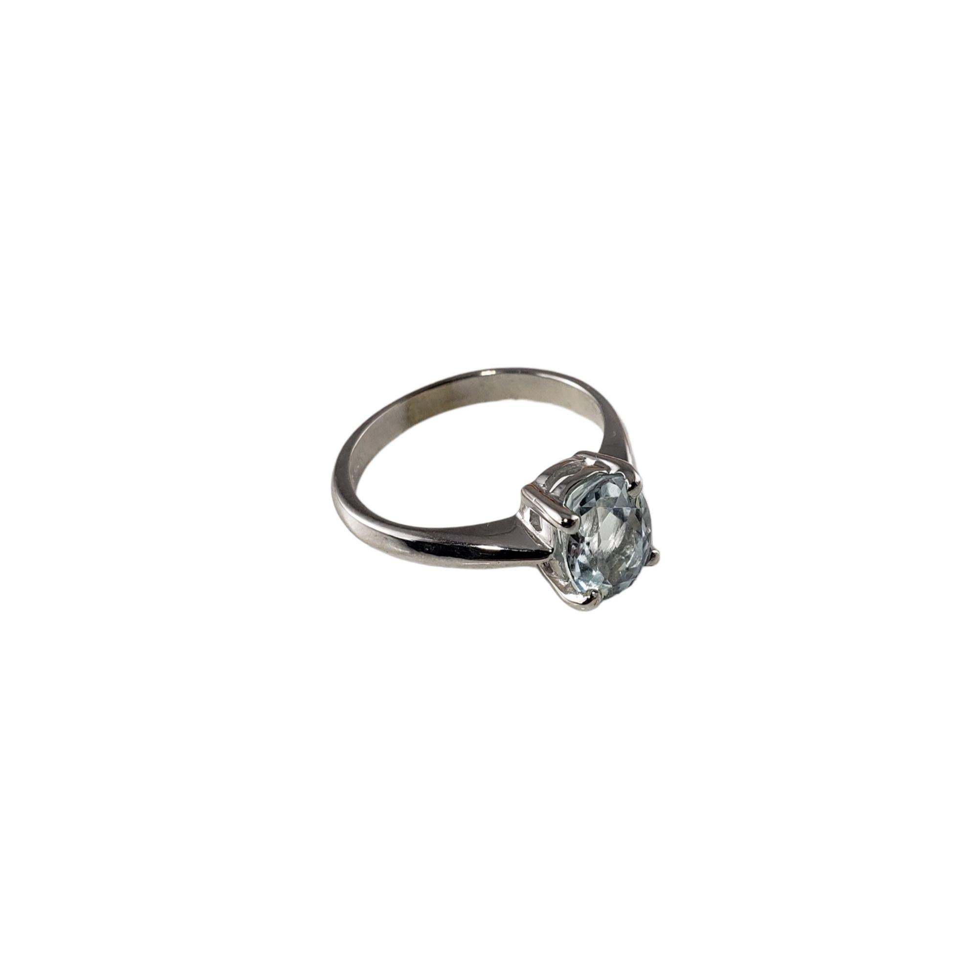 Vintage 14 Karat White Gold Aquamarine Ring Size 5.5-

This lovely ring features one oval aquamarine (8 mm x 6 mm) set in classic 14K white gold. Shank: 2 mm.

Aquamarine weight: 1.15 ct.

Ring Size: 5.5

Weight: 1.7 dwt. / 2.7 gr.

Stamped: