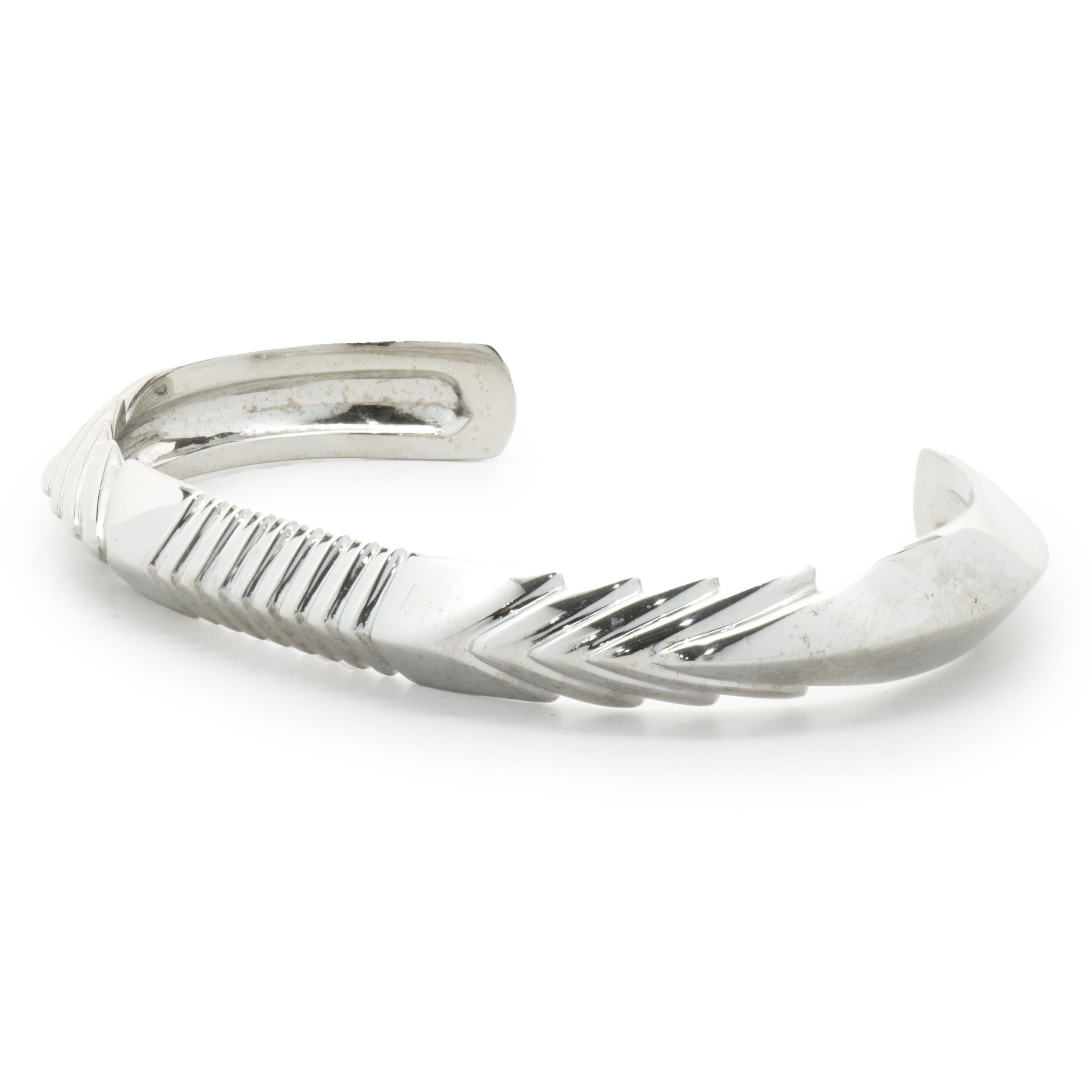 Material: 14K white gold
Dimensions: bracelet will fit up to a 6.5-inch wrist
Weight: 42.72 grams