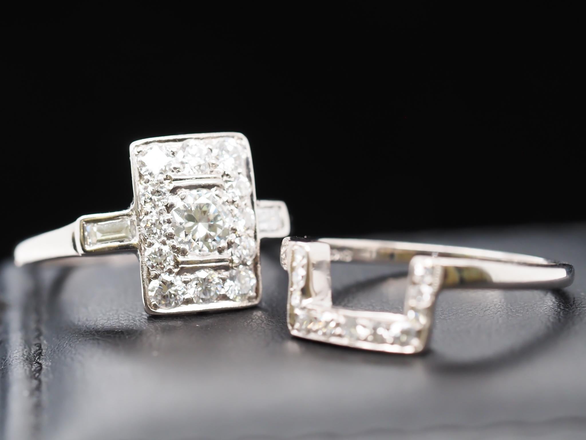 Year: 1940s

Item Details:
Ring Size: 6.75
Metal Type: 14K White Gold [Hallmarked, and Tested]
Weight: 7.6 grams

Diamond Details: .90ct, total weight. F-G Color, VS Clarity. Old European Brilliant Diamonds, Natural.

Band Width: 1.5mm