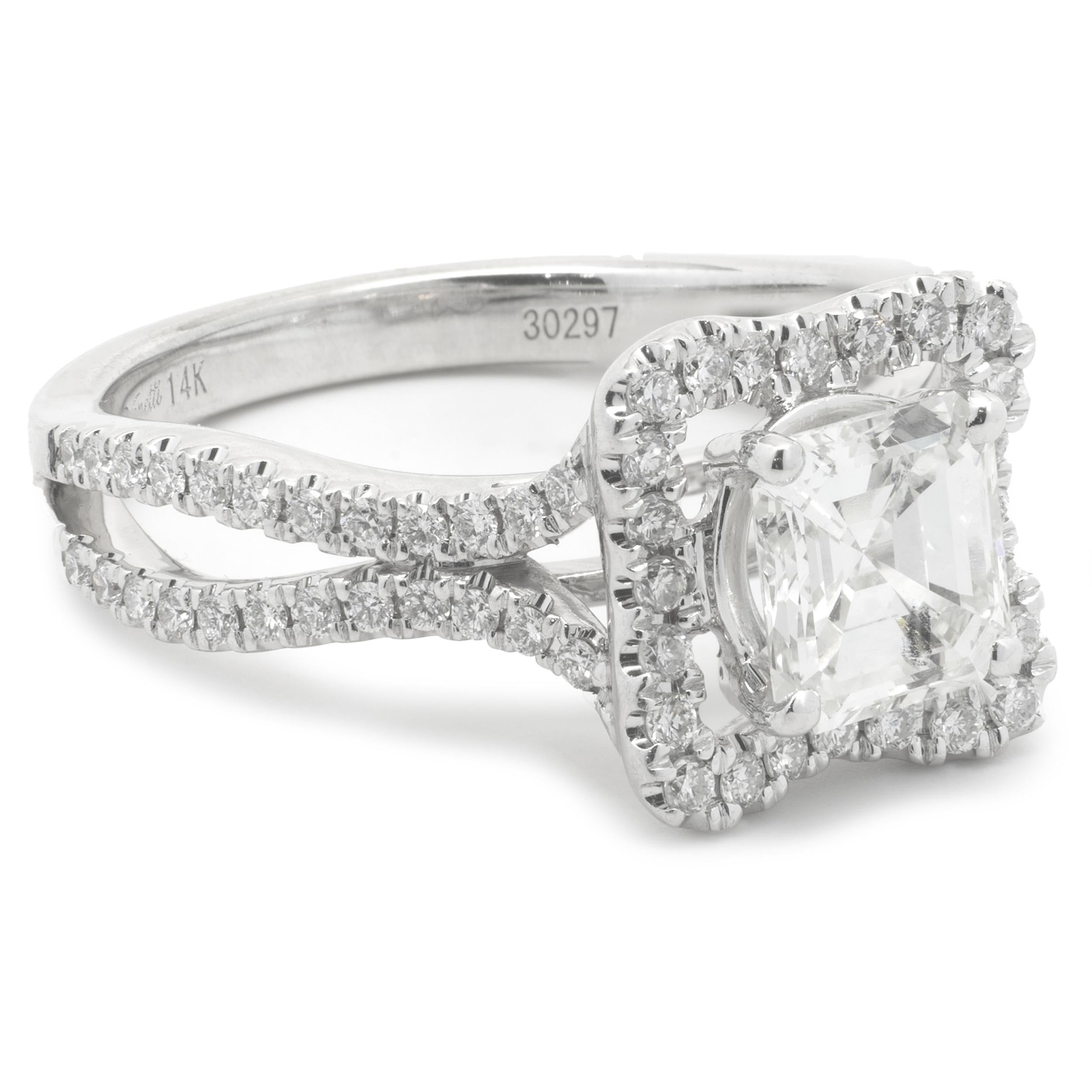 Designer: custom
Material: 14K white gold 
Diamond: 1 asscher cut = 1.10ct
Color: I
Clarity: VS1
Diamond: 72 round brilliant cut = .75cttw
Color:  G
Clarity: VS1-2
Ring Size: 6.5 (please allow up to 2 additional business days for sizing