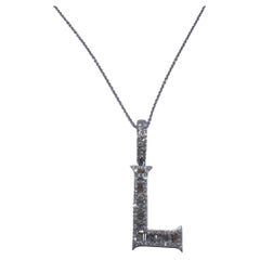 14 Karat White Gold Baguette and Round Diamond "L" Initial Pendant Necklace