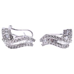 14 Karat White Gold Baguette and Round Diamond Swirl Earrings 14 Karat White Gold Baguette and Round Diamond Swirl Earrings