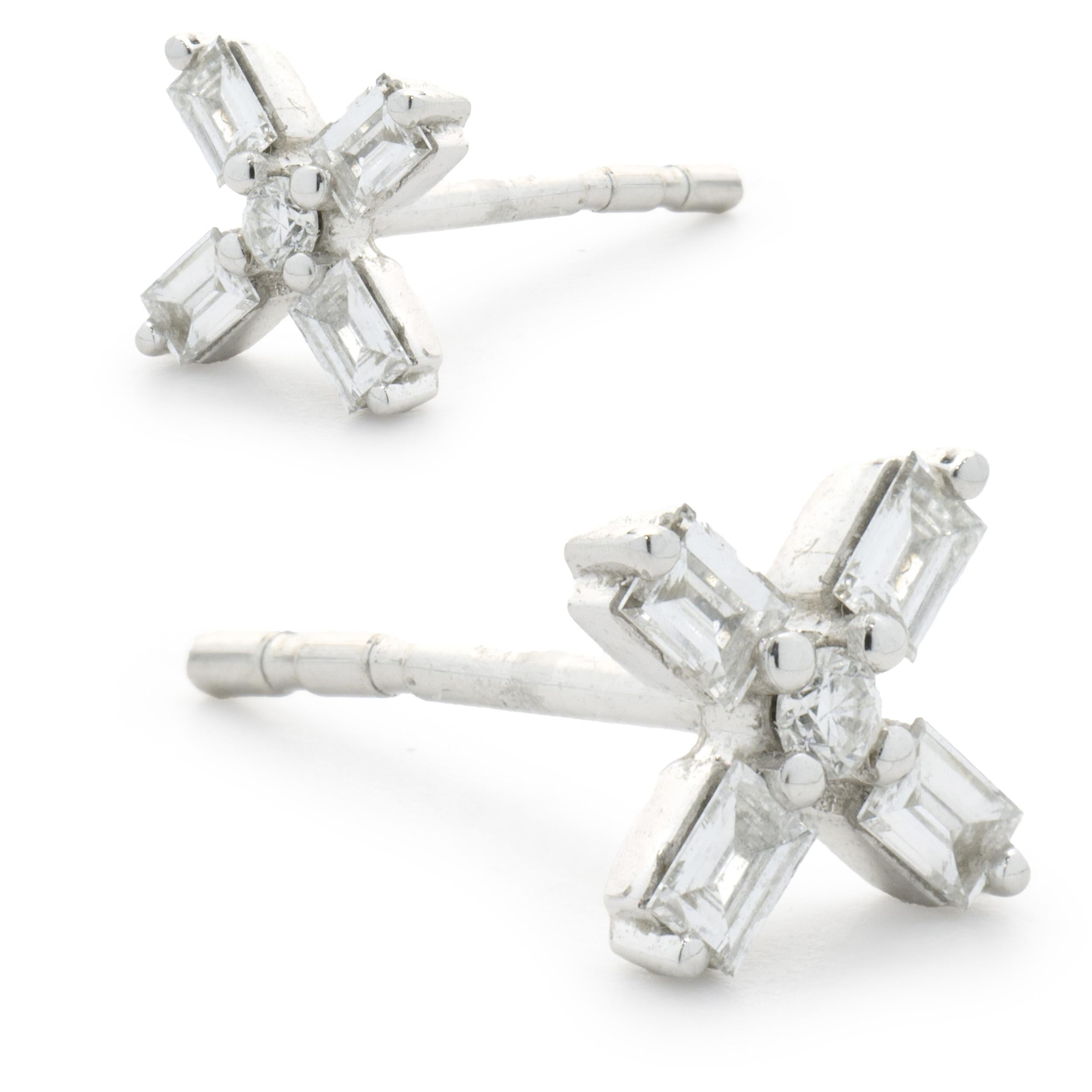 Material: 14k white gold
Diamonds: 8 baguette cut = 0.24cttw
Color: G
Clarity: SI1
Diamonds: 2 round cut = 0.03cttw
Color: G
Clarity: SI1
Dimensions: earrings measure approximately 13 x 6mm in diameter
Fastenings: friction
Weight: 1.15 grams
