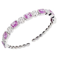 18 kt. Bracelet jonc en or blanc avec saphirs roses naturels et diamants