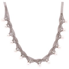 Collier de perles en or blanc 14 carats