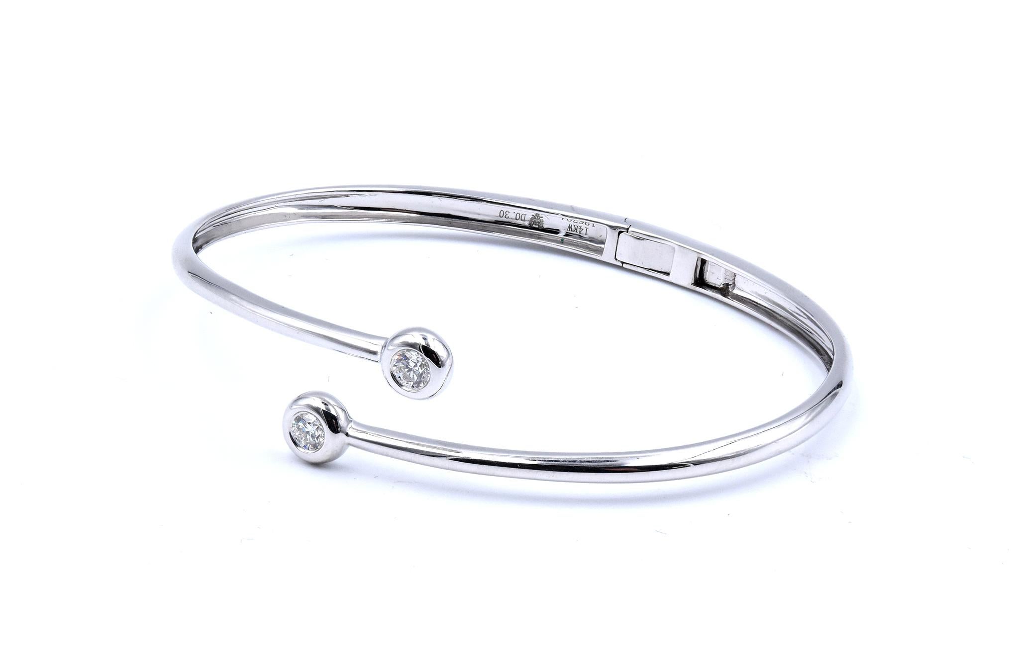 Material: 18K Weißgold
Diamanten: 2 runde Diamanten im Brillantschliff = .28cttw
Farbe: G
Klarheit: VS2
Abmessungen: Das Armband passt an ein Handgelenk von bis zu 6,5 Zoll
Gewicht: 9,06 Gramm

